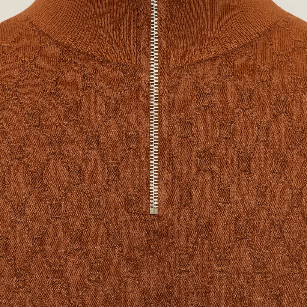 Patterned knit sweater with a half-zip collar.