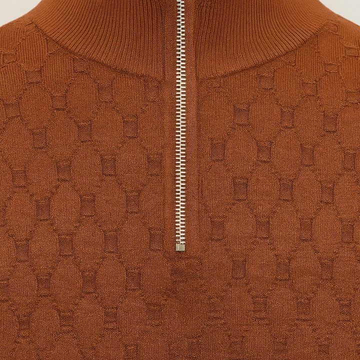 Patterned knit sweater with a half-zip collar.