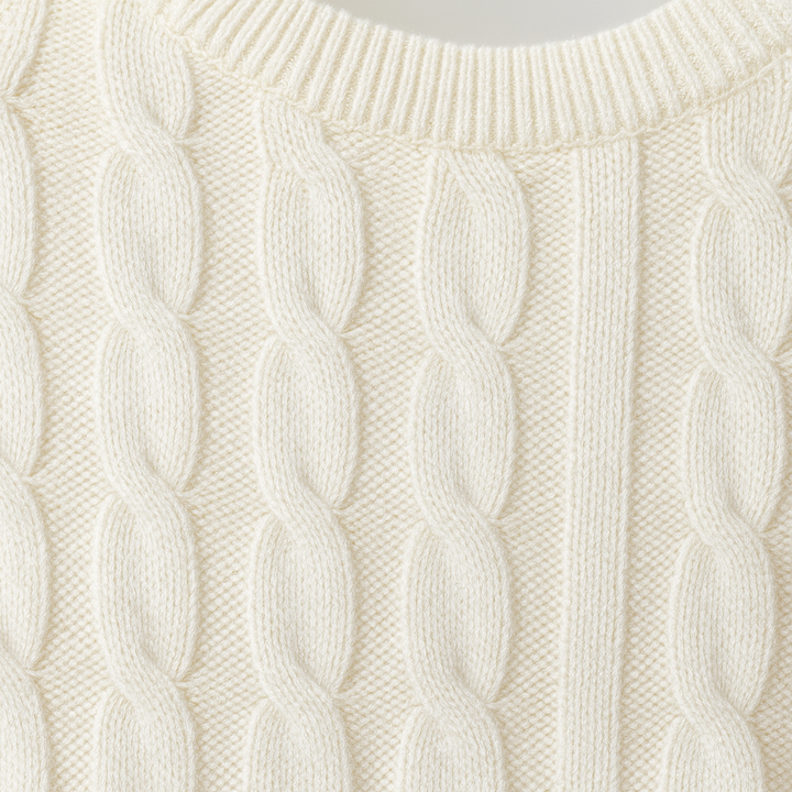 Cable-knit crewneck sweater.