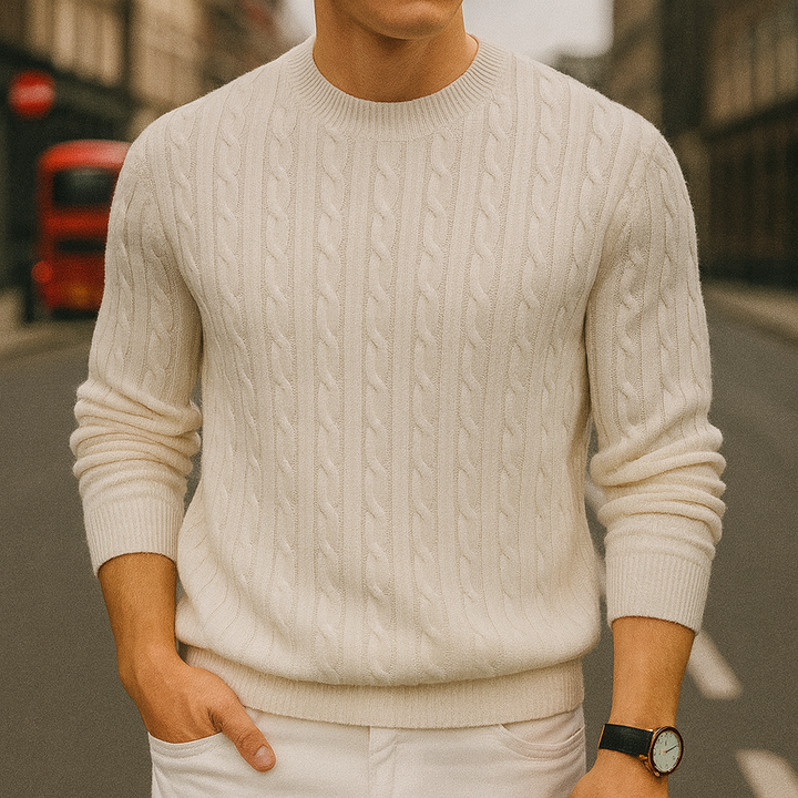 Cable-knit crewneck sweater.