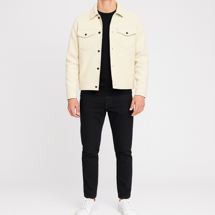 Men’s corduroy jacket with button-up front, chest flap pockets, and side pockets.