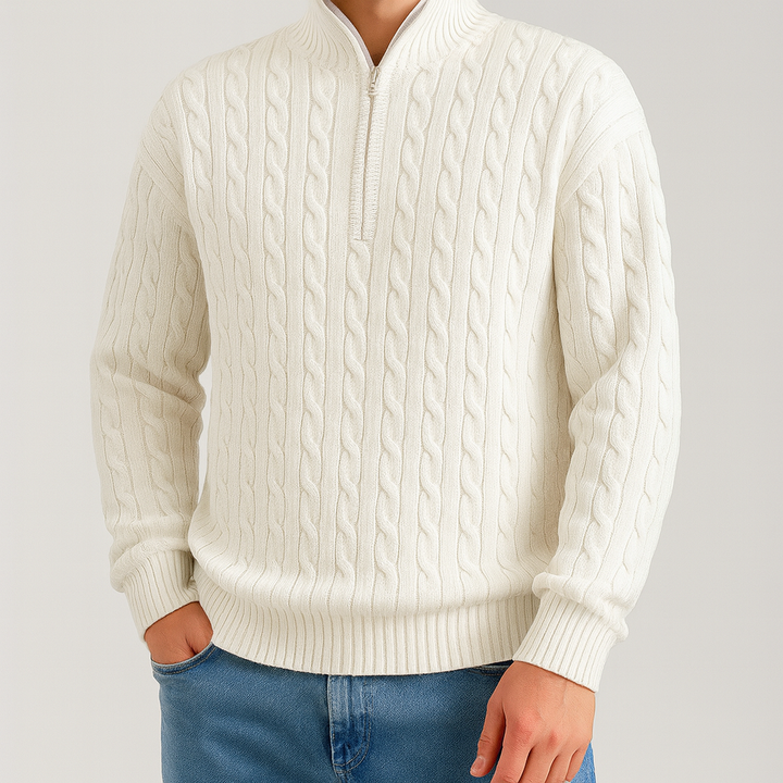 Cable-knit sweater with a half-zip stand collar.