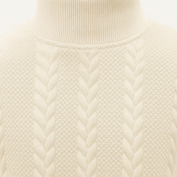 Textured cable-pattern mock-neck sweater.