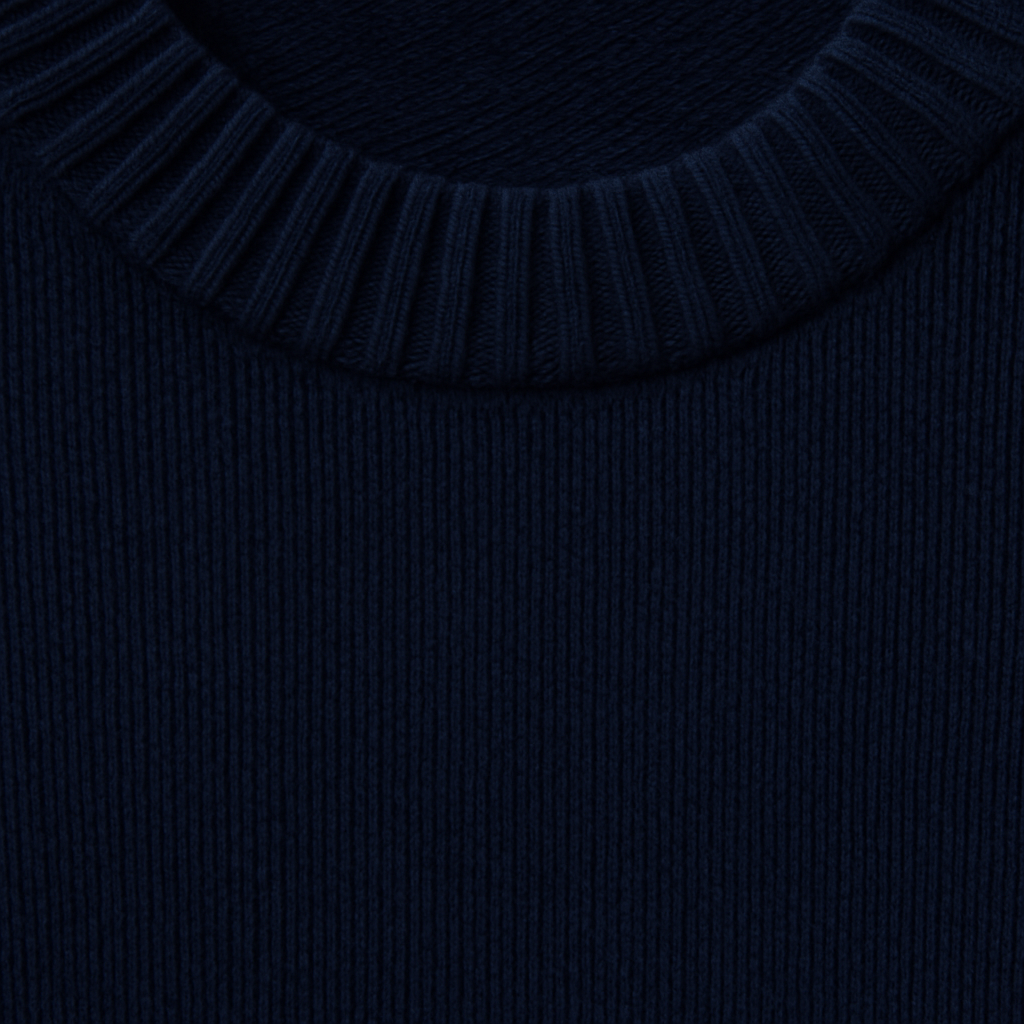 Loose-fit crewneck knit sweater.