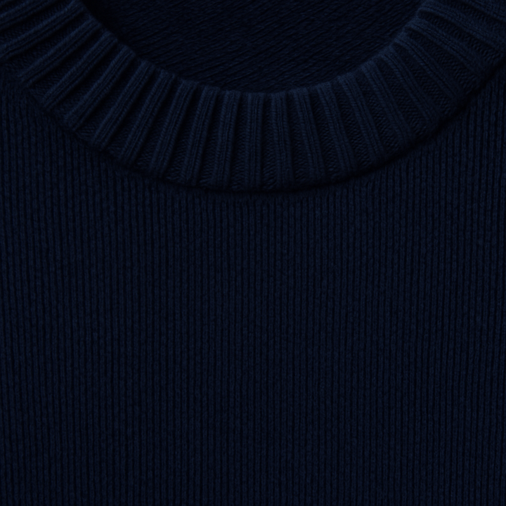 Loose-fit crewneck knit sweater.