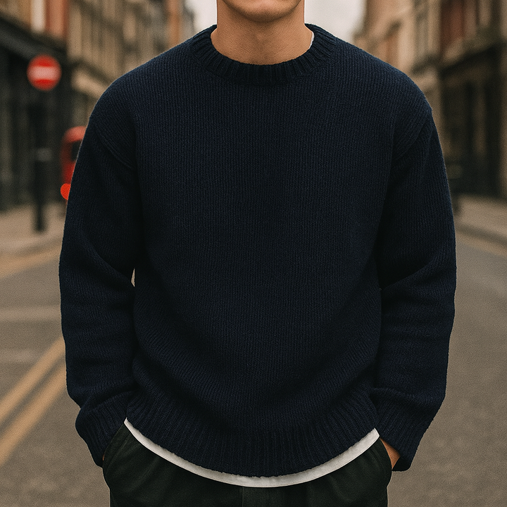 Loose-fit crewneck knit sweater.