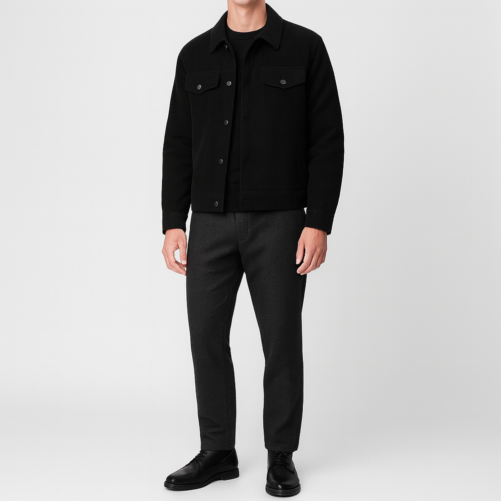 Men’s corduroy jacket with snap-button front, chest flap pockets, and lined interior.